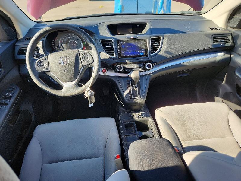 Photo 8 from auction – 2015 HONDA CR-V with VIN 2HKRM4H54FH674666