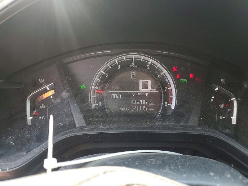Photo 9 from auction – 2018 HONDA CR-V with VIN 2HKRW5H32JH424303