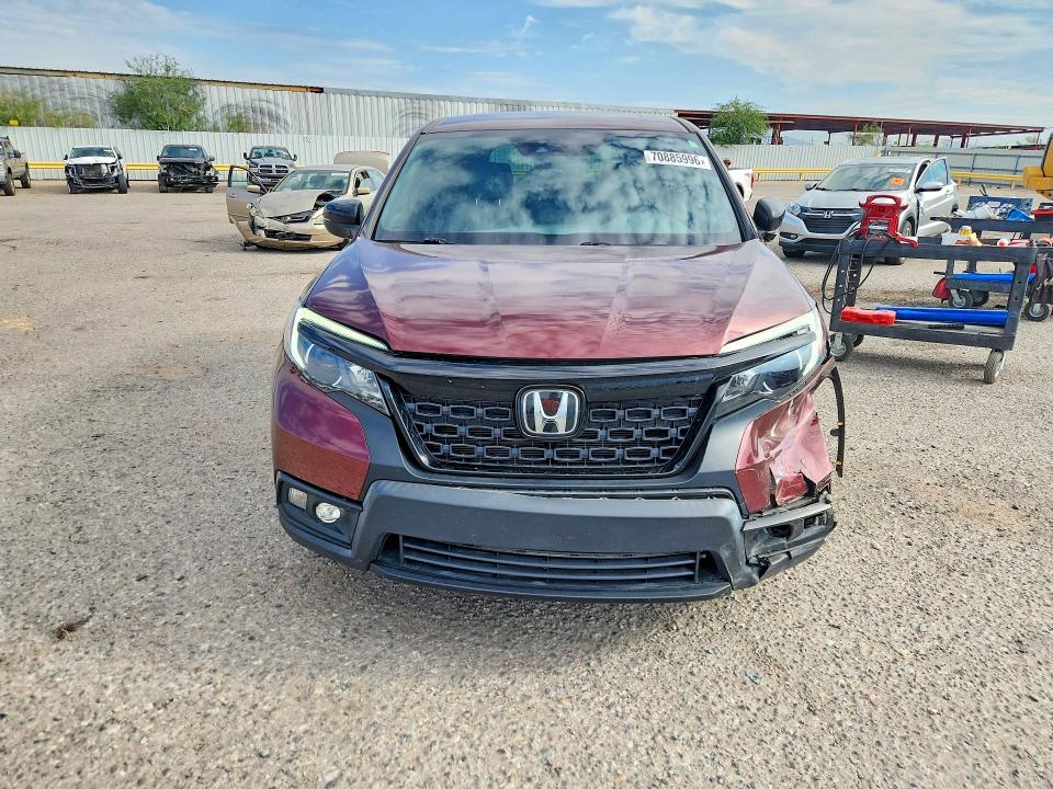 Photo 5 from auction – 2021 HONDA PASSPORT with VIN 5FNYF7H50MB003224