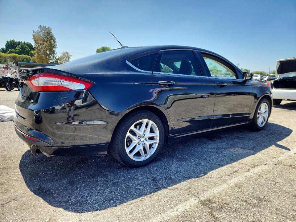 Photo 3 from auction – 2013 FORD FUSION with VIN 3FA6P0H77DR261791