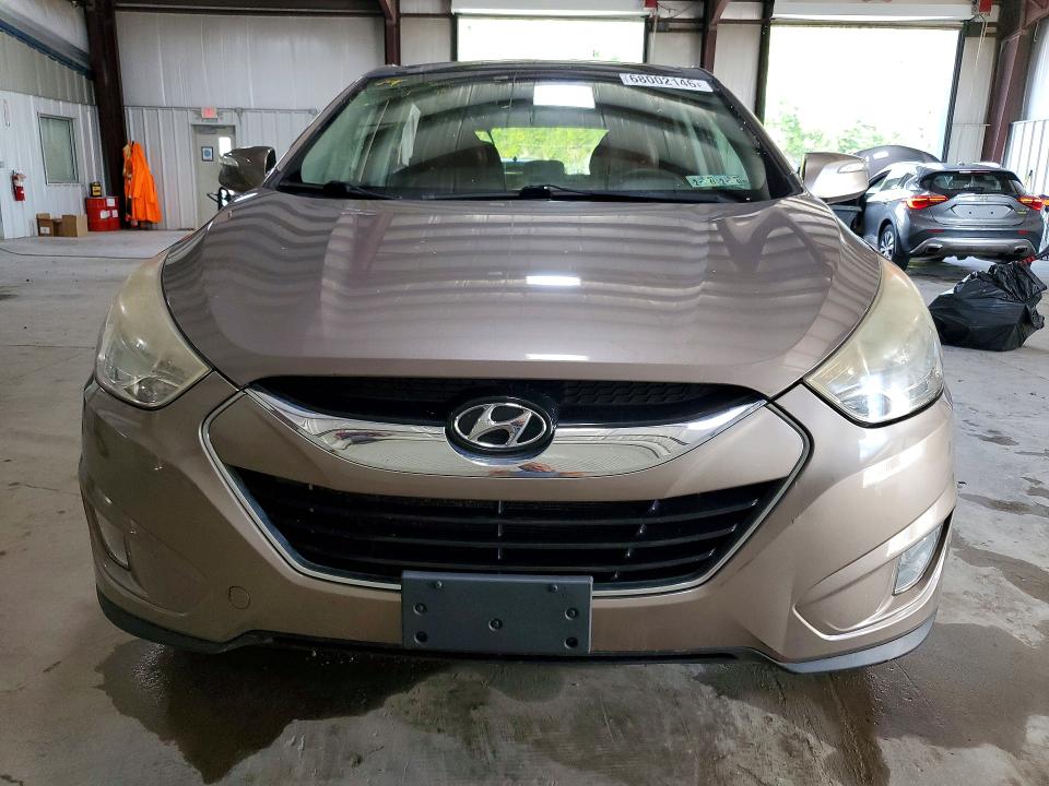 Photo 5 from auction – 2012 HYUNDAI TUCSON with VIN KM8JUCAC8CU478808