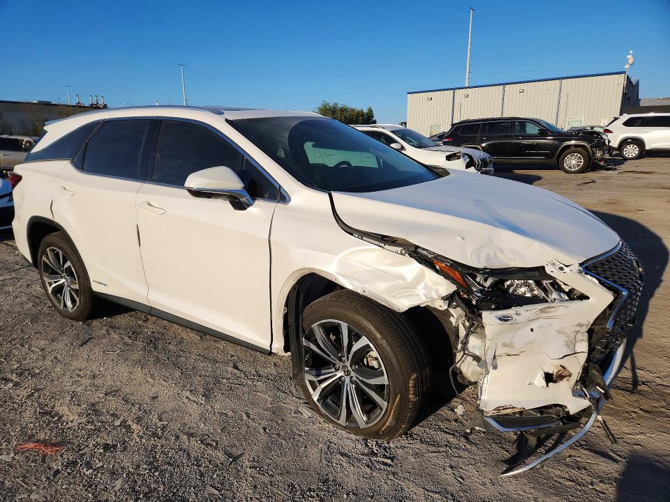 Photo 4 from auction – 2021 LEXUS RX with VIN JTJHGKFA9M2021155