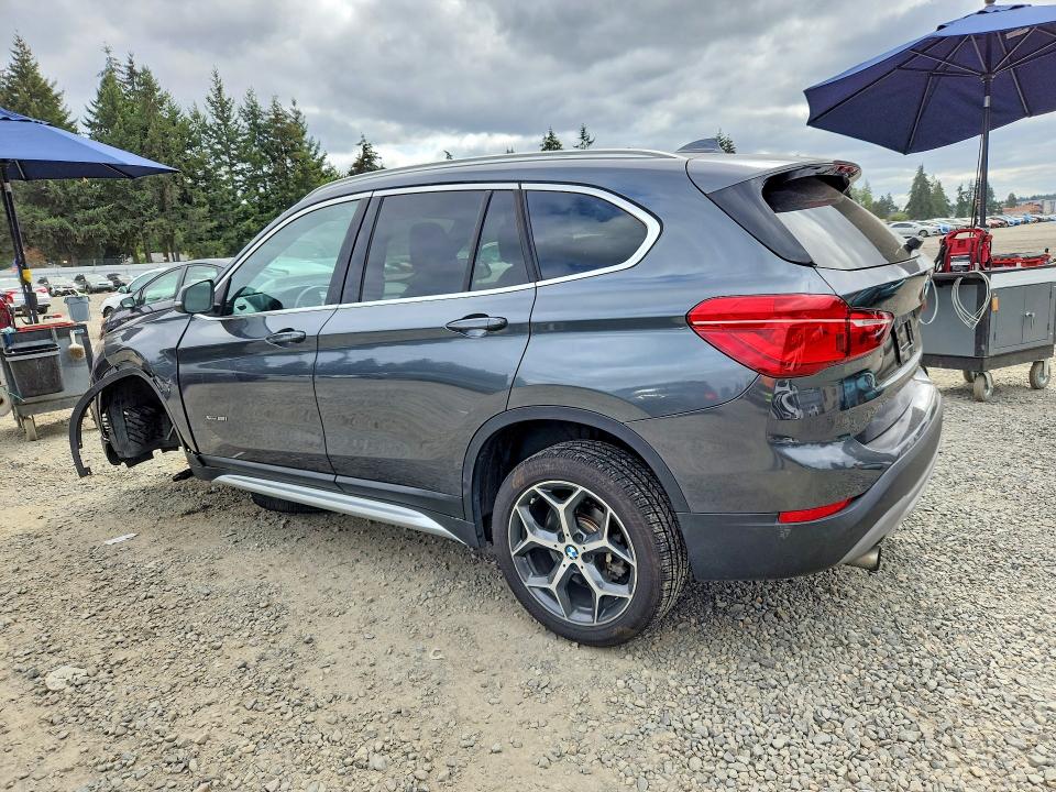 Photo 2 from auction – 2017 BMW X1 with VIN WBXHT3C34H5F83209