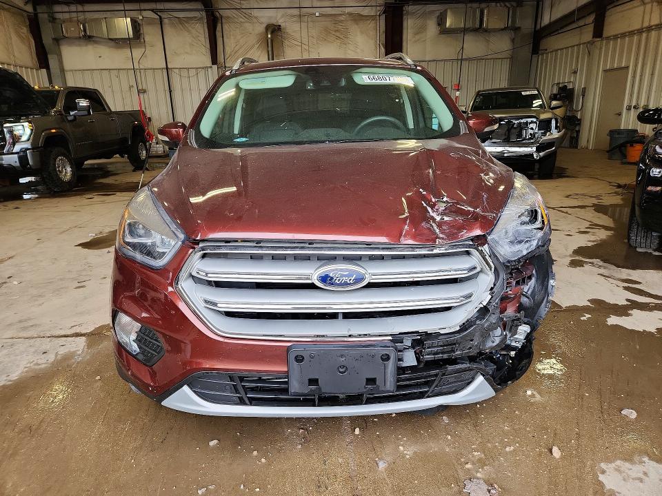 Photo 5 from auction – 2018 FORD ESCAPE with VIN 1FMCU9J98JUB59292