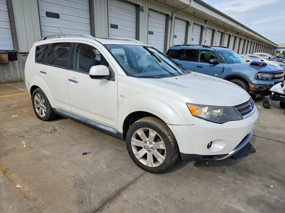 Снимка 4 от търг – 2009 MITSUBISHI OUTLANDER с VIN JA4LT31W79Z005854