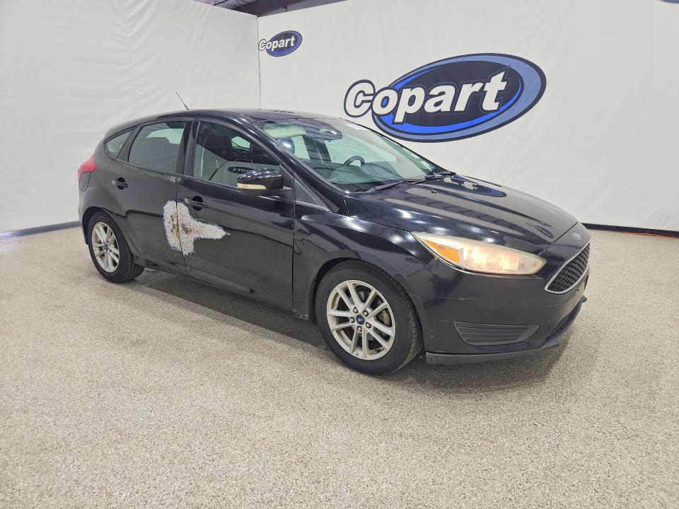 Foto 4 de la subasta – 2016 FORD FOCUS con VIN 1FADP3K21GL272083