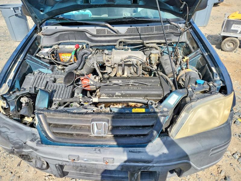 Photo 12 from auction – 1998 HONDA CR-V with VIN JHLRD284XWC017655