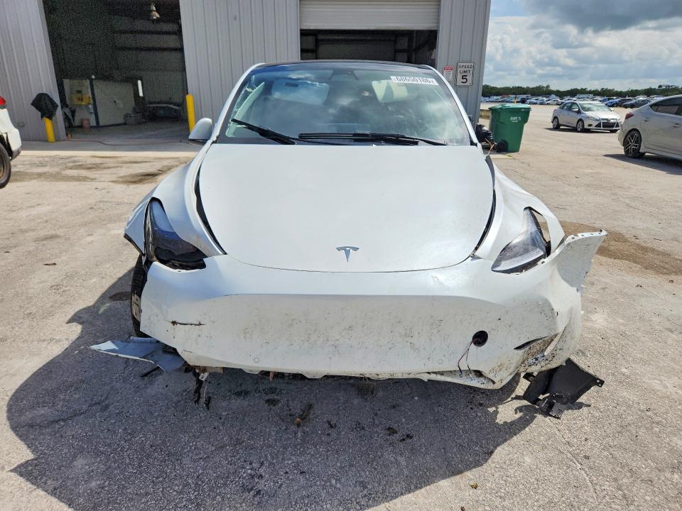 Photo 5 from auction – 2022 TESLA MODEL Y with VIN 7SAYGDEF8NF522986