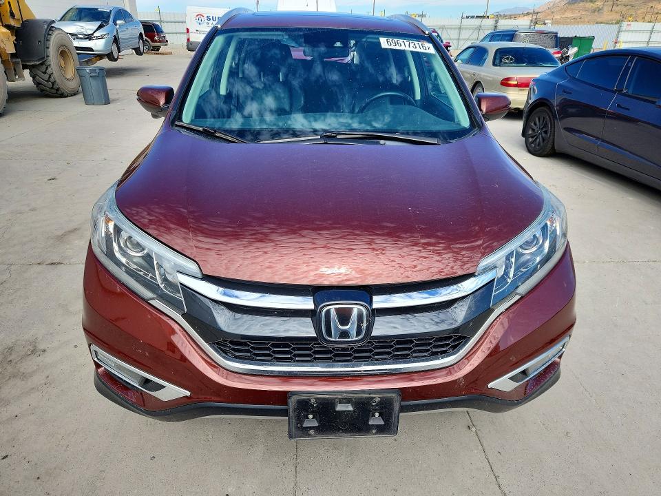 Photo 5 from auction – 2015 HONDA CR-V with VIN 5J6RM4H92FL016756