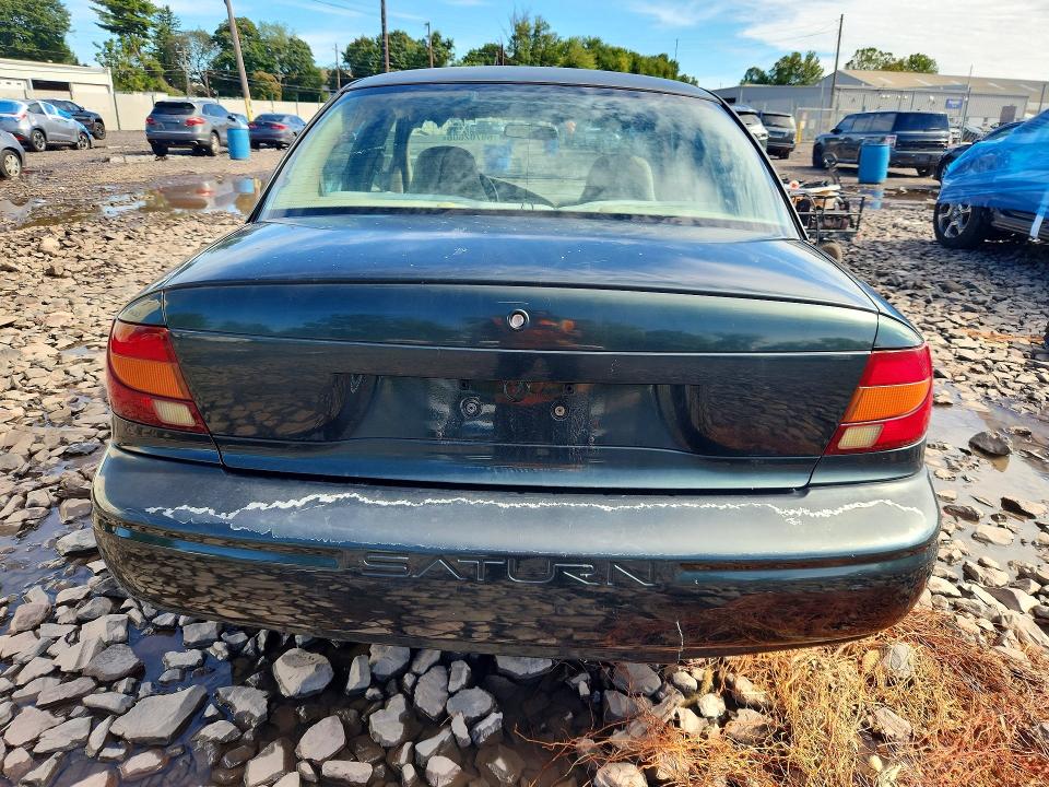 Снимка 6 от търг – 2002 SATURN SL1 с VIN 1G8ZH52832Z157157