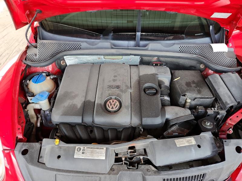 Photo 11 from auction – 2014 VOLKSWAGEN BEETLE with VIN 3VWJX7ATXEM606912