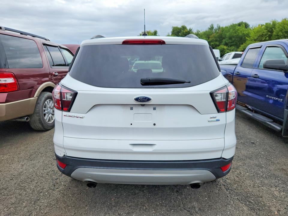 Photo 6 from auction – 2018 FORD ESCAPE with VIN 1FMCU9GD0JUD11514