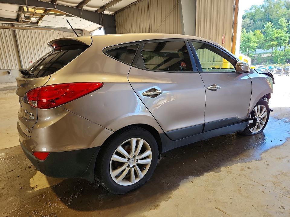 Photo 3 from auction – 2012 HYUNDAI TUCSON with VIN KM8JUCAC1CU375682