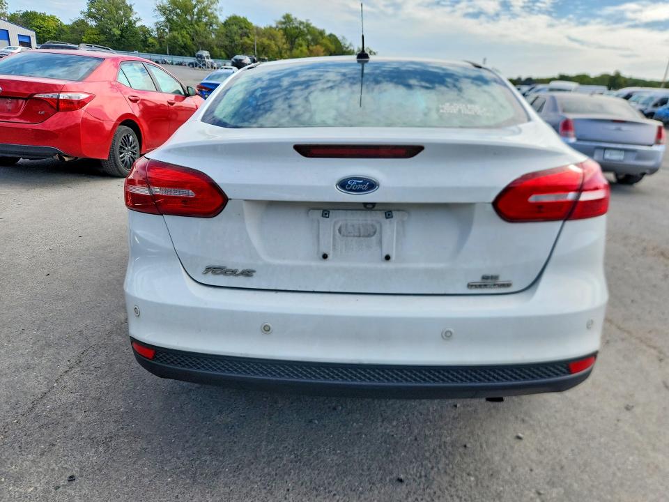 Снимка 6 от търг – 2016 FORD FOCUS с VIN 1FADP3F27GL214294