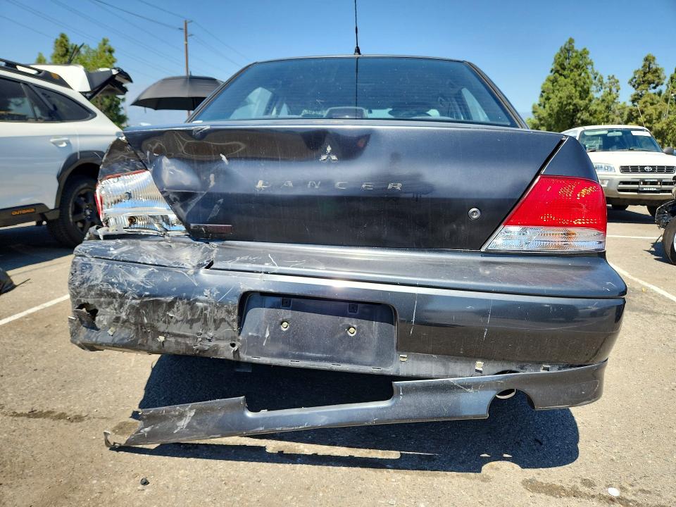 Photo 6 from auction – 2002 MITSUBISHI LANCER with VIN JA3AJ86E72U080765