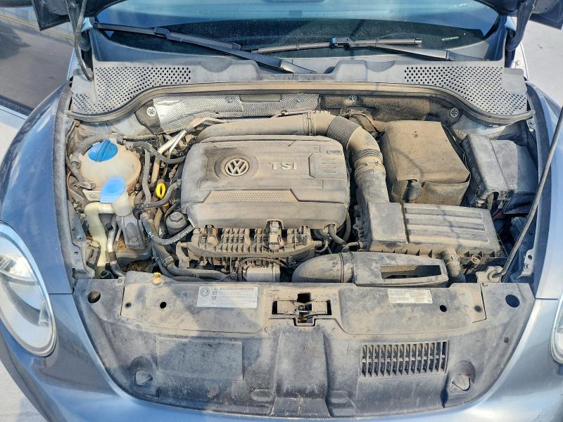 Photo 11 from auction – 2013 VOLKSWAGEN BEETLE with VIN 3VW7T7AT1DM833054