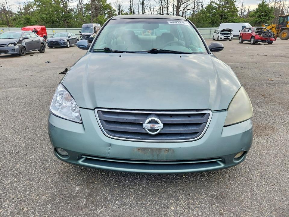 Photo 5 from auction – 2003 NISSAN ALTIMA with VIN 1N4AL11D13C339877
