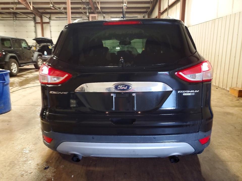 Снимка 6 от търг – 2016 FORD ESCAPE с VIN 1FMCU9J97GUB85844