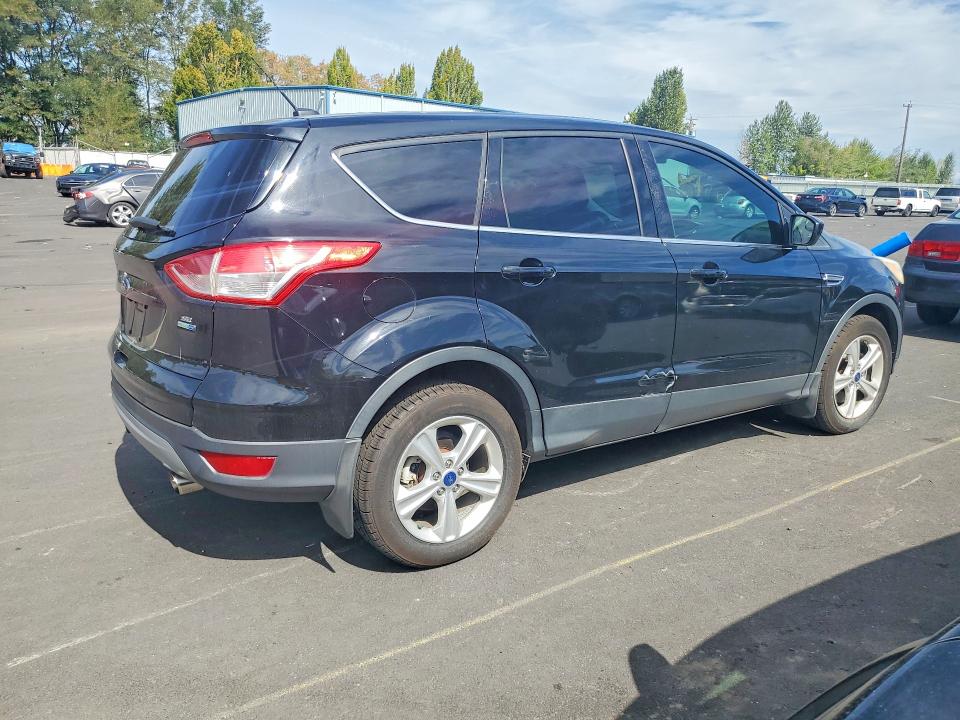 Photo 3 from auction – 2016 FORD ESCAPE with VIN 1FMCU9GX3GUA10612