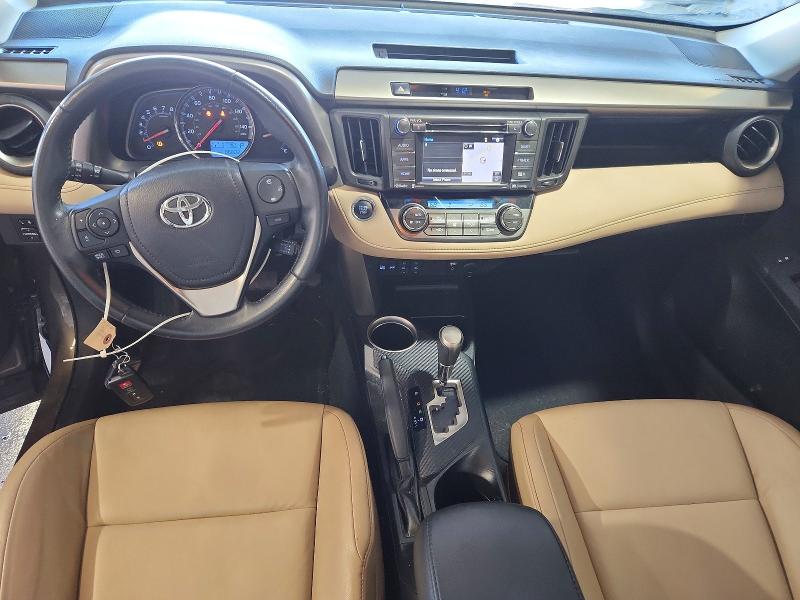 Photo 8 from auction – 2014 TOYOTA RAV4 with VIN 2T3DFREV2EW158562