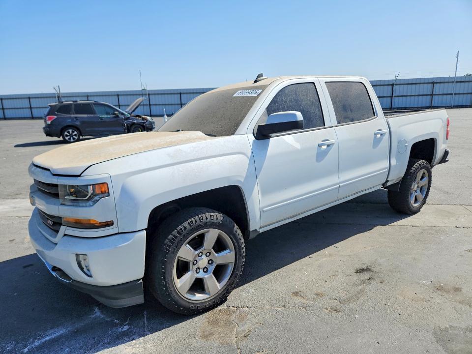 CHEVROLET SILVERADO 2018 with VIN 3GCUKREC3JG297829 - Photo from auction