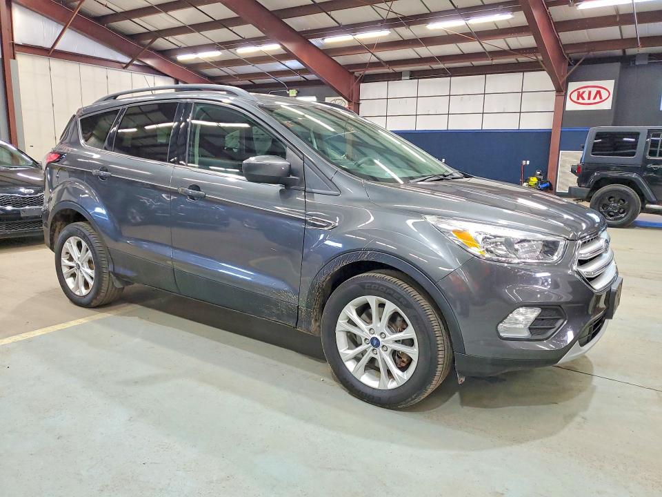 Foto 4 de la subasta – 2018 FORD ESCAPE con VIN 1FMCU9GD9JUB78770