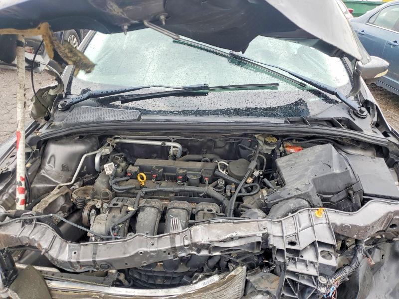 Photo 11 from auction – 2014 FORD FOCUS with VIN 1FADP3N25EL270099