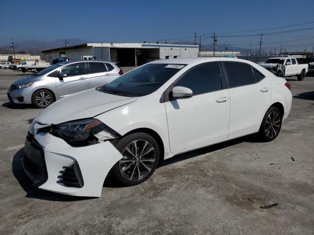 TOYOTA COROLLA L 2019 with VIN 5YFBURHE2KP911957 - Photo from auction