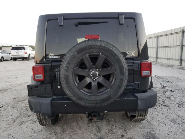 Photo 6 from auction – 2011 JEEP WRANGLER U with VIN 1J4BA7H13BL610160