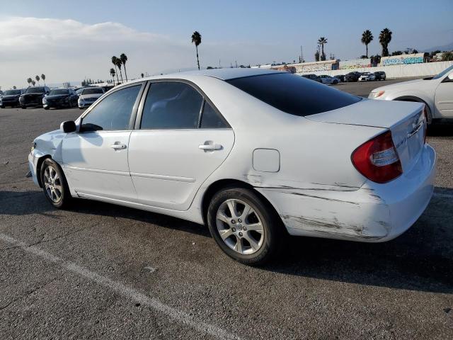 Photo 2 from auction – 2004 TOYOTA CAMRY LE with VIN JTDBE32K940273468