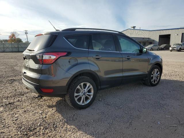 Photo 3 from auction – 2017 FORD ESCAPE SE with VIN 1FMCU9G99HUC92063