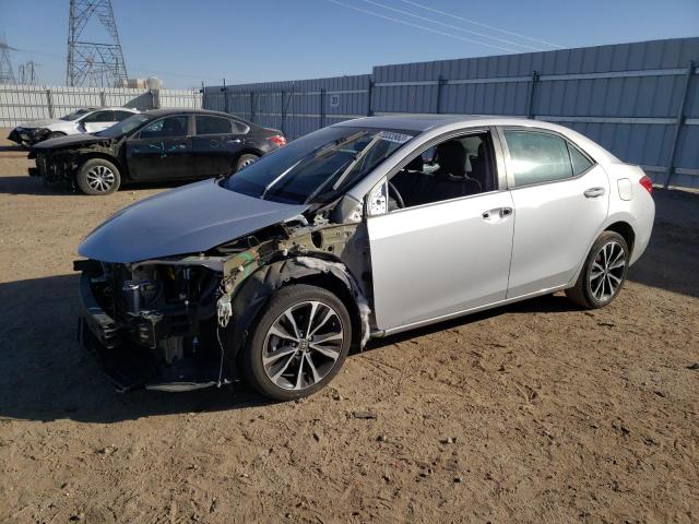 TOYOTA COROLLA L 2017 with VIN 5YFBURHE5HP638070 - Photo from auction