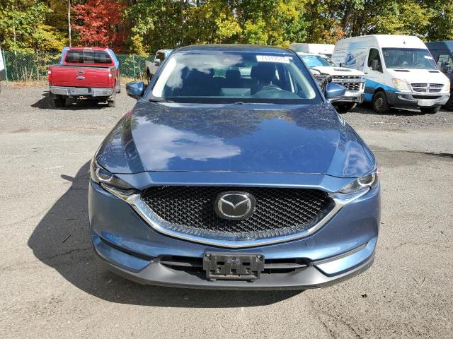 Photo 5 from auction – 2021 MAZDA CX-5 SPORT with VIN JM3KFBBM3M0354448