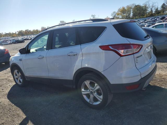 Photo 2 from auction – 2014 FORD ESCAPE SE with VIN 1FMCU9GX9EUD76894