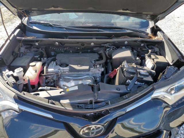 Photo 12 from auction – 2018 TOYOTA RAV4 LE with VIN 2T3ZFREV1JW472459