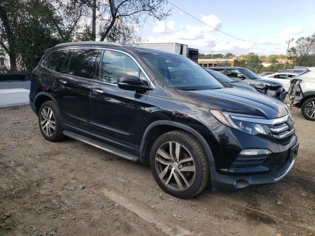 Photo 4 from auction – 2017 HONDA PILOT ELIT with VIN 5FNYF6H07HB055311