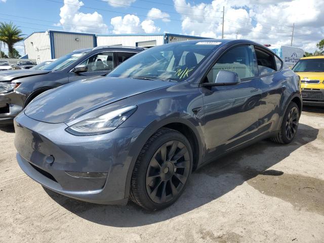 TESLA MODEL Y 2023 with VIN 7SAYGDEE4PA075127 - Photo from auction