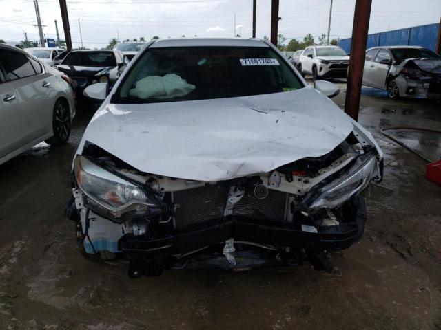 Photo 5 from auction – 2014 TOYOTA COROLLA L with VIN 2T1BURHEXEC122766
