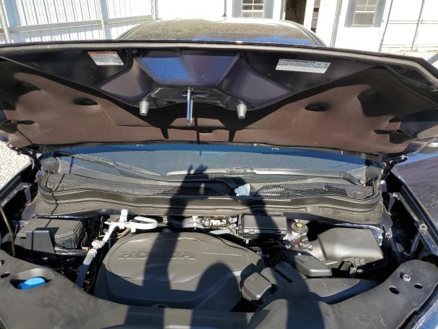 Photo 12 from auction – 2023 HONDA PASSPORT E with VIN 5FNYF8H58PB028494