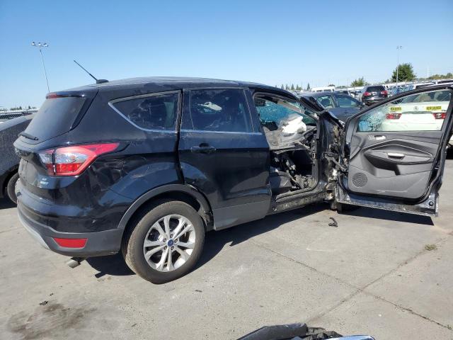 Photo 3 from auction – 2017 FORD ESCAPE SE with VIN 1FMCU9GD7HUC83589