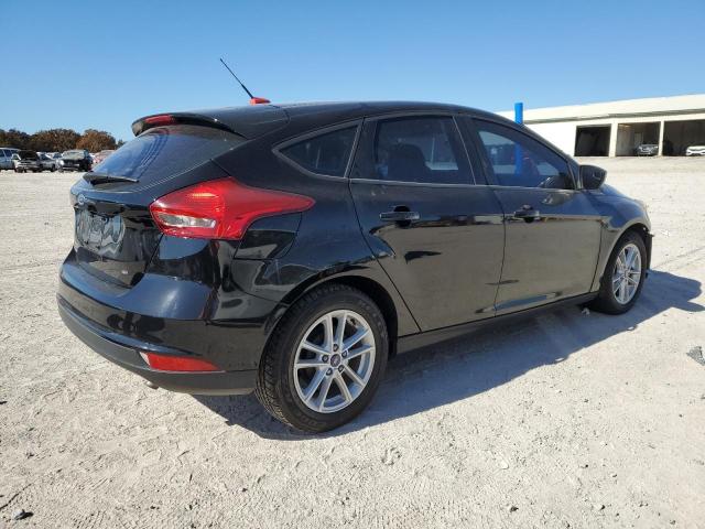 Photo 3 from auction – 2018 FORD FOCUS SE with VIN 1FADP3K29JL308190