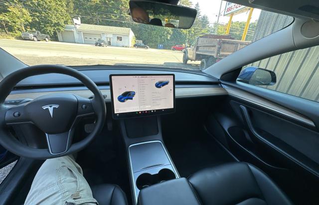 Photo 9 from auction – 2021 TESLA MODEL 3 with VIN 5YJ3E1EA8MF093394