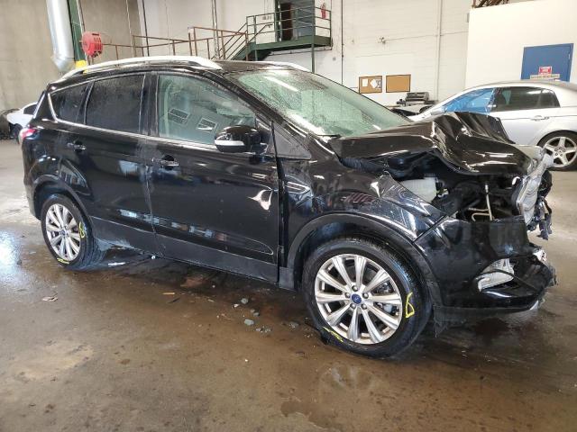 Photo 4 from auction – 2017 FORD ESCAPE TIT with VIN 1FMCU9J9XHUD92729