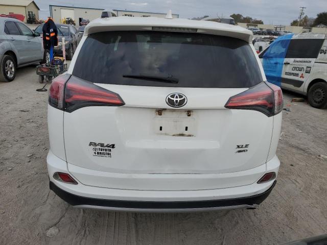 Photo 6 from auction – 2016 TOYOTA RAV4 XLE with VIN 2T3RFREV8GW475657