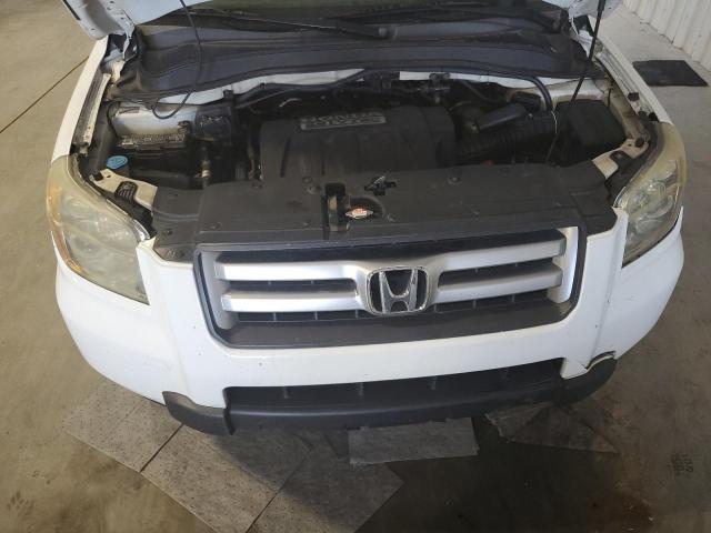 Photo 12 from auction – 2006 HONDA PILOT EX with VIN 5FNYF28536B015129