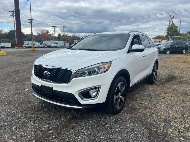 Photo 2 from auction – 2016 KIA SORENTO EX with VIN 5XYPHDA59GG006537