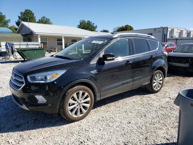 FORD ESCAPE TIT 2018 with VIN 1FMCU0J98JUA71466 - Photo from auction