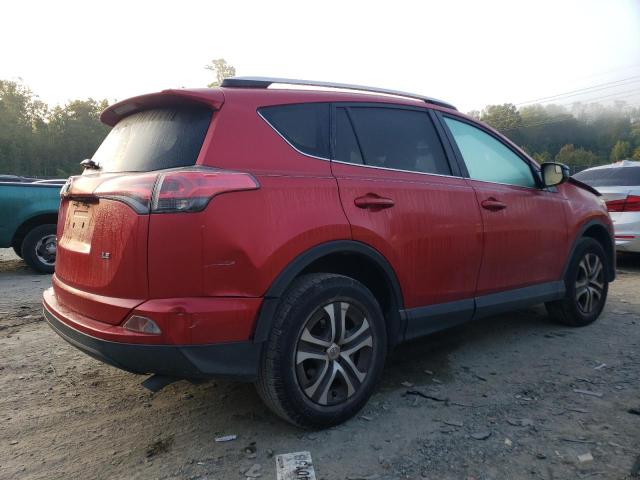 Photo 3 from auction – 2016 TOYOTA RAV4 LE with VIN JTMZFREV0GJ063411