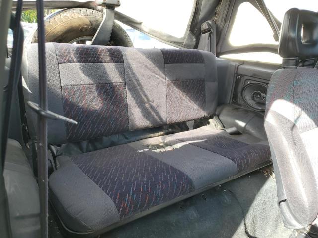 Photo 10 from auction – 1998 CHEVROLET TRACKER with VIN 2CNBJ1865W6901283