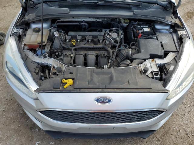 Photo 11 from auction – 2016 FORD FOCUS SE with VIN 1FADP3F24GL343044